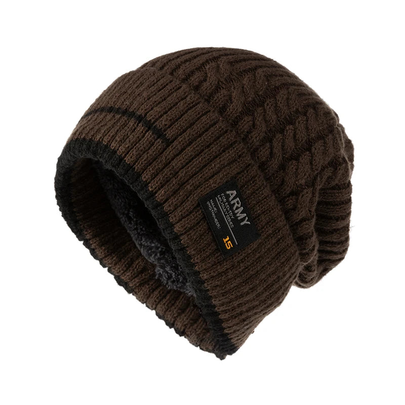 Brown cable knit beanie with black inner lining and patch detail, shown on a white background