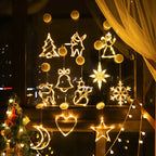 Warm white LED Christmas ornaments in shapes like stars, trees, and snowflakes hanging on a window