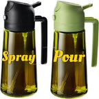 Two clear oil bottles side by side, one with a black lid and one with a green lid, both with handles