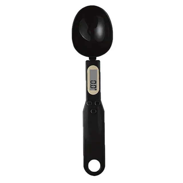 Black digital measuring spoon with a small LCD screen on the handle, shown on a white background