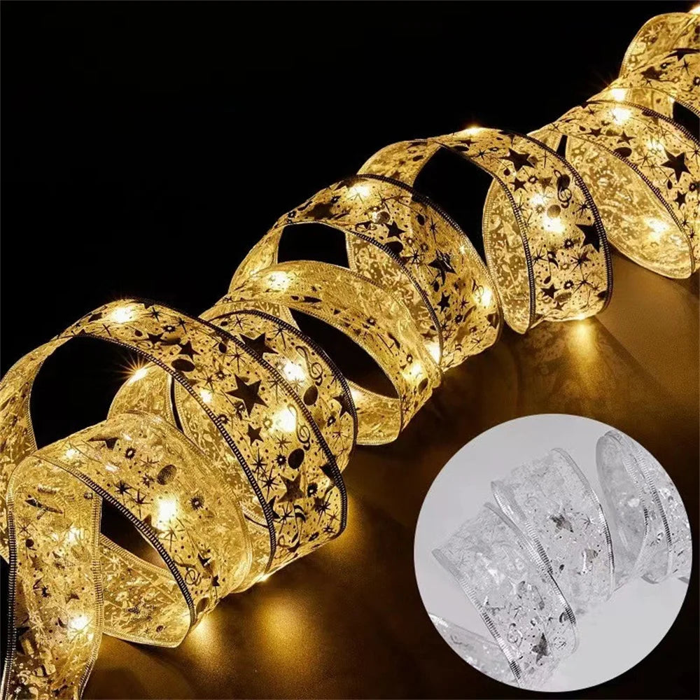Golden ribbon string lights with star and swirl patterns glowing on a dark surface, inset shows unlit silver version