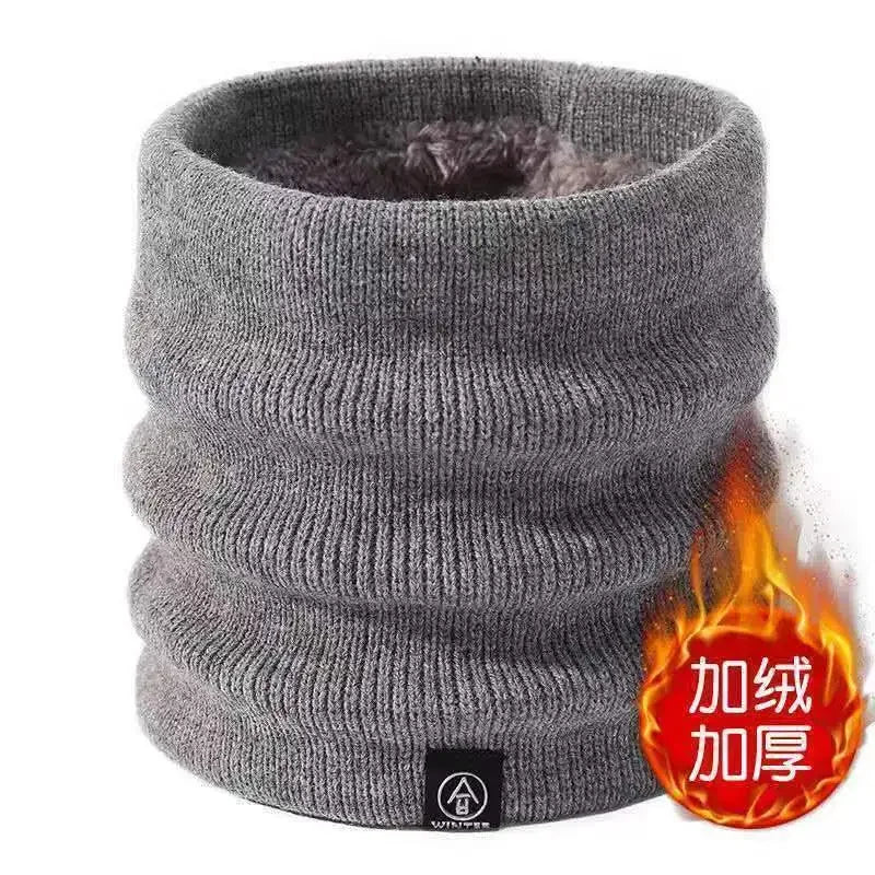 Gray knitted winter neck warmer with a soft inner lining, upright on a white background, flame graphic on side