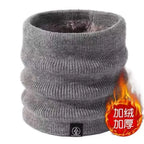 Gray knitted winter neck warmer with a soft inner lining, upright on a white background, flame graphic on side
