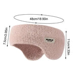 Light pink fuzzy ear warmer headband with size measurements in centimeters and inches, close-up view
