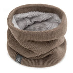Knitted brown neck warmer with soft grey fleece lining, shown standing up on a white background