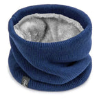 Dark blue knitted neck warmer with soft grey fleece lining, shown standing on a white background