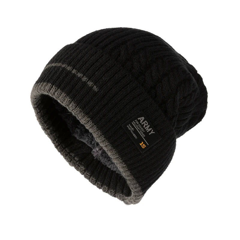 Black cable knit beanie with dark gray trim and patch detail, angled on a plain white background