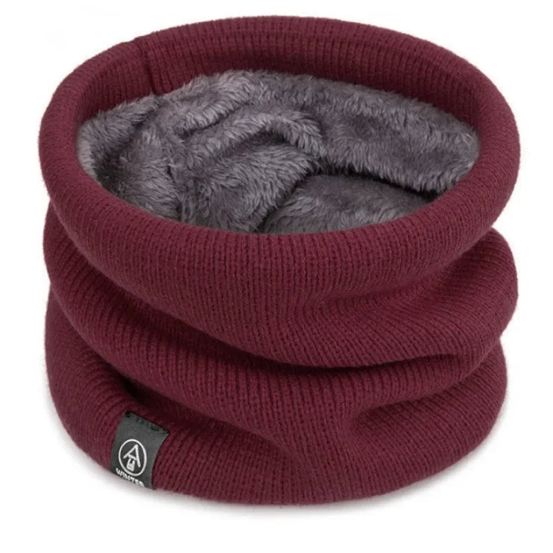 Burgundy knitted neck warmer with soft gray fleece lining, shown standing upright on a white background