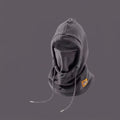 Dark grey fleece winter hood with built-in face covering, drawstrings, and a small yellow patch