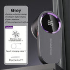 Grey rechargeable lint remover with purple trim, LED display showing 86, shown on a counter