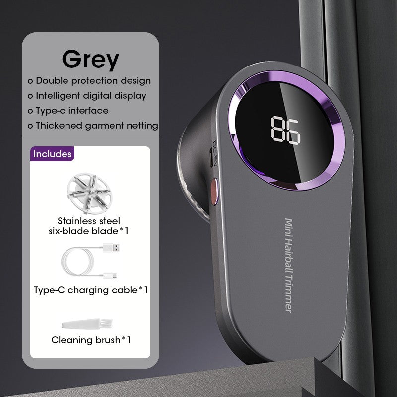 Grey rechargeable lint remover with purple trim, LED display showing 86, shown on a counter